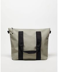 Rains - Mini cabas avec logo ton sur ton - kaki clair - Lyst
