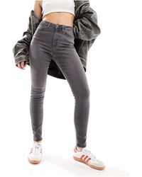 Vero Moda - Sophia - jean skinny à taille haute - délavé - Lyst