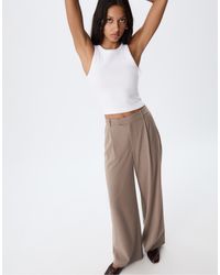 Stradivarius - – gestreifte, elegante hose mit weitem bein - Lyst