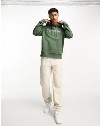 Calvin Klein - Sudadera caqui con capucha y logo hero - Lyst