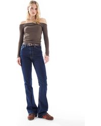 ASOS - Asos Design Tall Mid Rise Flare Jeans - Lyst