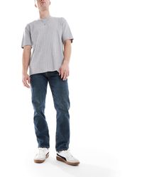 Superdry - – vintage – schmal geschnittene straight jeans - Lyst