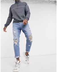 Vaqueros carrot tapered con rotos en negro Bershka de Denim de color Negro  para hombre - Lyst