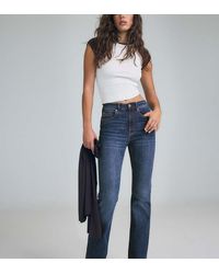 Stradivarius - Petite D74 Flared Jeans With Slit - Lyst