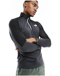 The North Face - Training mountain athletic - top a maniche lunghe con zip corta - Lyst
