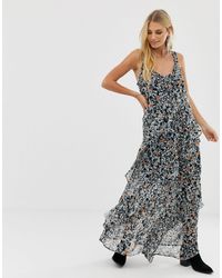 religion prosperity ruffle maxi dress