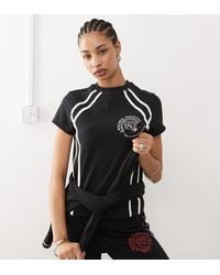 Collusion - T-Shirt Mini Sportiva Nera Con Profili A Contrasto - Lyst