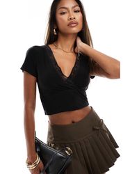 Fashionkilla - Slinky Double Layered Plunge Cropped T-Shirt With Lace Trim - Lyst