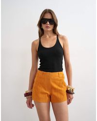TOPSHOP - Real Suede Patch Micro Shorts - Lyst
