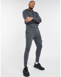 Pantalones cargo con cadena en negro Bershka de Denim de color Negro para  hombre | Lyst