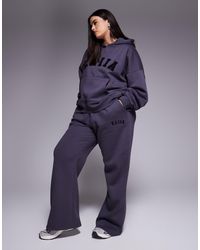 Kaiia - Plus – weit geschnittene jogginghose - Lyst