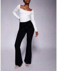 ASOS - Pantaloni A Vita Alta Neri A Zampa Con Cintura Allacciata - Lyst
