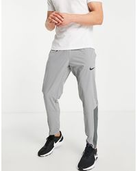 Nike Nike Pro Training Therma-fit Sphere Trackies in Stone (Natural) for  Men | Lyst Australia