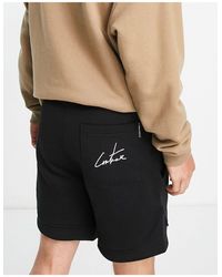 The Couture Club - Pantalones cortos s con logo estampado - Lyst