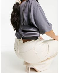 Claudia Canova - Sac porté épaule petit format à rabat avec liseré contrastant - noir - Lyst