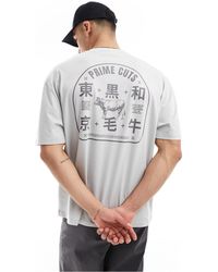ASOS - Camiseta extragrande con estampado animal estilo souvenir - Lyst