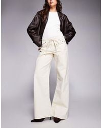 Edikted - Grommet Tie Low Rise Jeans - Lyst
