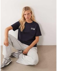 New Balance - Athletics Premium Logo Hip Length Relaxed T-Shirt - Lyst
