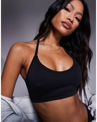4505 - Seamless Halter Neck Light Supports Sports Bra - Lyst