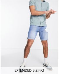 ASOS - Short en jean slim avec déchirures - foncé délavé - Lyst