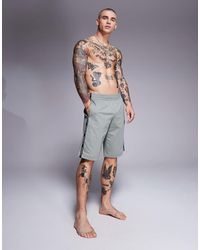 EA7 - Pantalones Cortos De Chándal Verde Salvia Con Bajos Sobrehilados Y Detalle De Cinta Del Logo De Armani - Lyst