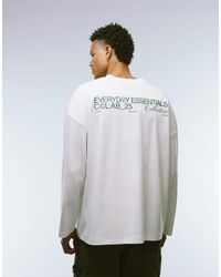 ASOS - Camiseta Blanca Extragrande De Manga Larga Con Sisas Caídas Y Estampado Gráfico De Texto De Tejido Muy Grueso Premium De - Lyst