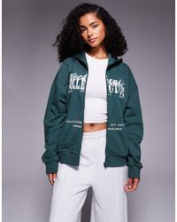 ASOS - Weekend Collective Zip Through Hoodie With Mixed Font Graphic - Lyst
