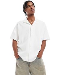 BOSS - Camicia Comoda A Maniche Corte Color Pietra Piqué Con Colletto A Rever - Lyst