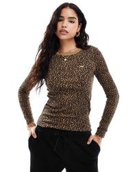 Levi's - Batwing Logo Cheetah Print Long Sleeve T-shirt - Lyst