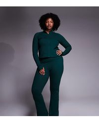 4505 - Curve Icon High Waist Slim Kick Yoga legging - Lyst