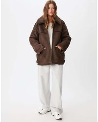 Stradivarius - Faux Shearling Lined Coat With Seams - Lyst