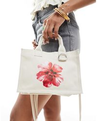 Stradivarius - Petit sac en toile avec détail fleur - écru - Lyst