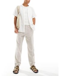 Abercrombie & Fitch - Malone - pantaloni ampi beige con pieghe - Lyst