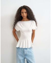 TOPSHOP - Knitted Grown On Short Sleeve Peplum Top - Lyst