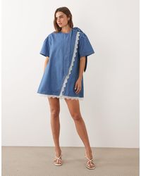 Ghospell - Denim Puff Sleeve Lace Trim Wrap Detail Mini Dress - Lyst
