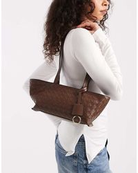 ASOS - Bolso De Hombro Marrón Alargado Con Diseño Entretejido De - Lyst