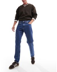 Calvin Klein - Jeans dritti stile anni '90, lavaggio medio - Lyst