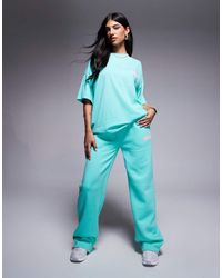 Kaiia - Joggers Color Aguamarina Y Rosa Pastel De Pernera Ancha Con Logo Estampado En Relieve De (Parte De Un Conjunto)-Azul - Lyst