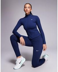 Nike - Nike – one training – figurbetontes, langärmliges oberteil - Lyst