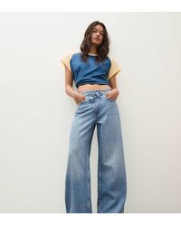 Bershka - Petite Wide-Leg Cross-Waist Jeans - Lyst