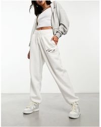 Nike - Swoosh Oversized Fleece High Waist Sweatpants - Lyst