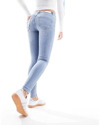 ONLY - Vaqueros Moldeadores De Talle Medio Y Corte Pitillo Con Lavado Azul Claro Power - Lyst
