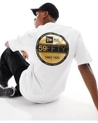KTZ - T-shirt bianca con grafica laminata effetto sticker sul retro - Lyst