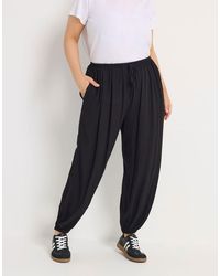 Yours Clothing - Cuffed Balloon Trousers - Lyst