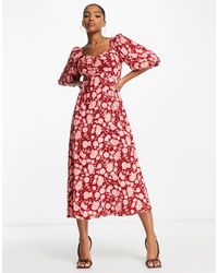 Nobody's Child - Kenya - robe mi-longue à fleurs avec manches bouffantes - rouge - Lyst
