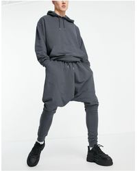 ASOS Tracksuit With Oversized Hoodie And Extreme Drop Crotch sweatpants - Black