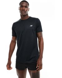 New Balance - Camiseta negra run - Lyst