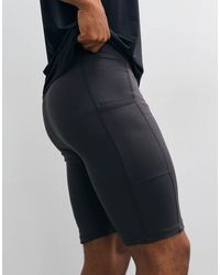 4505 - Icon Active Quick Dry Base Layer Training Half Tight With Phone Pocket - Lyst