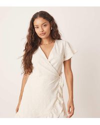 Vila - Jersey Broderie Wrap Mini Dress - Lyst