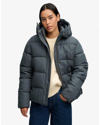 Superdry - Premium steppjacke mit kapuze und karomuster - Lyst